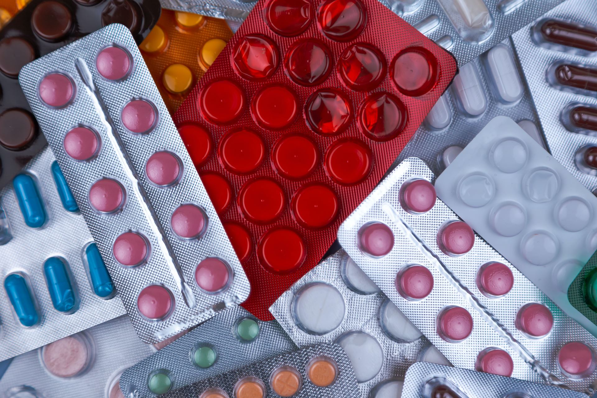 A collection of pills in blister packs