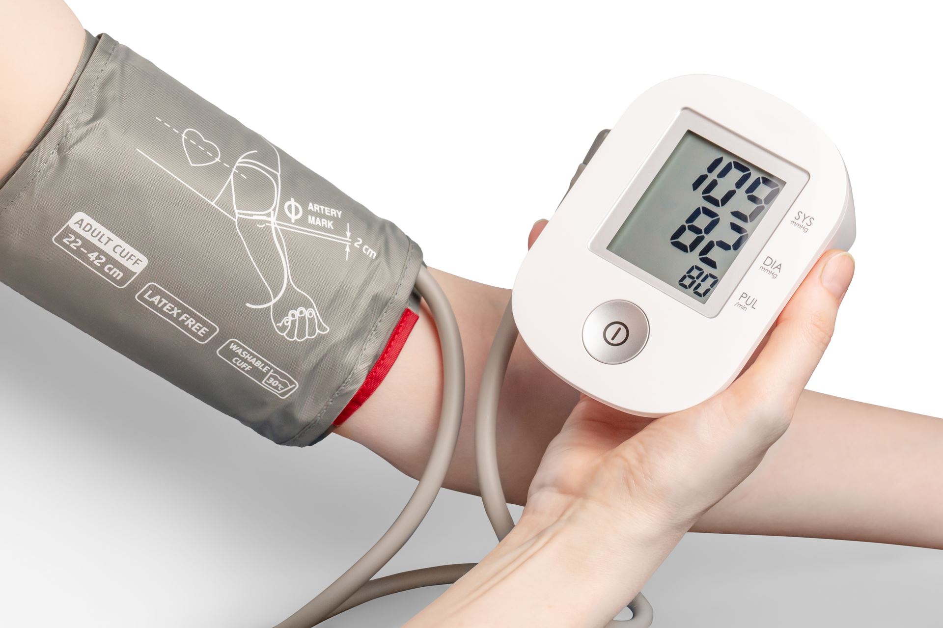 A blood pressure machine on a person's arm